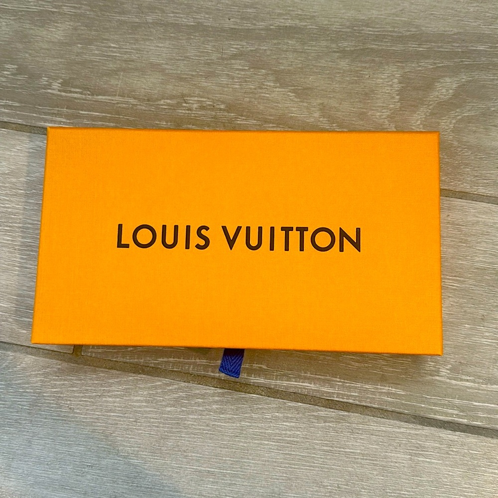 Louis Vuitton box with dust bag and receipt envelope 9 3/4” X 5 1/2”